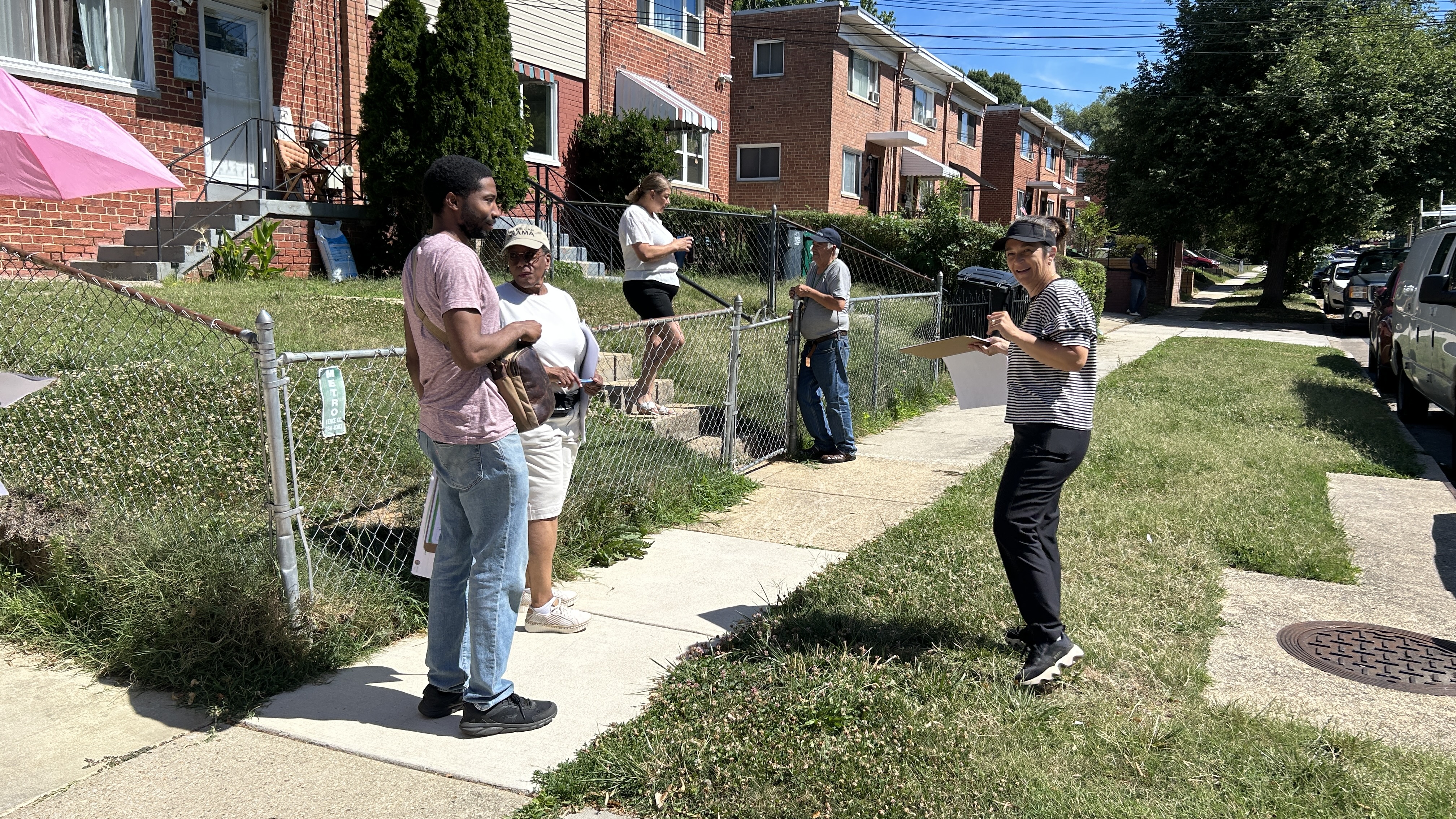 Participants of the Ward 4 Community meeting on June 20 prepare for a walking tour of the Jamestown Road project.